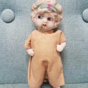 1930s bisque jointed arm  flapper doll made in Japan