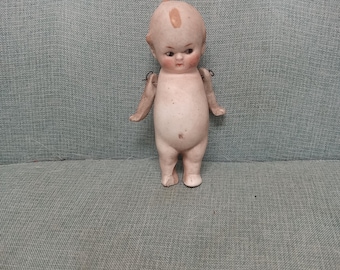 Petite poupée ancienne des années 1900 en biscuit de style lutin kewpie avec bras mobiles
