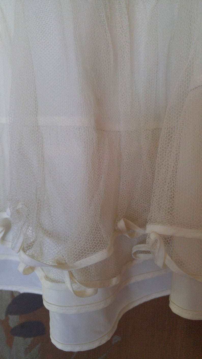 60/'s Ivory petticoat with frilly netting underneath