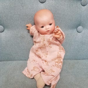 Antique 20s Armand Marseille dream baby bye - lo sleepy eyes doll with bisque head and cloth body