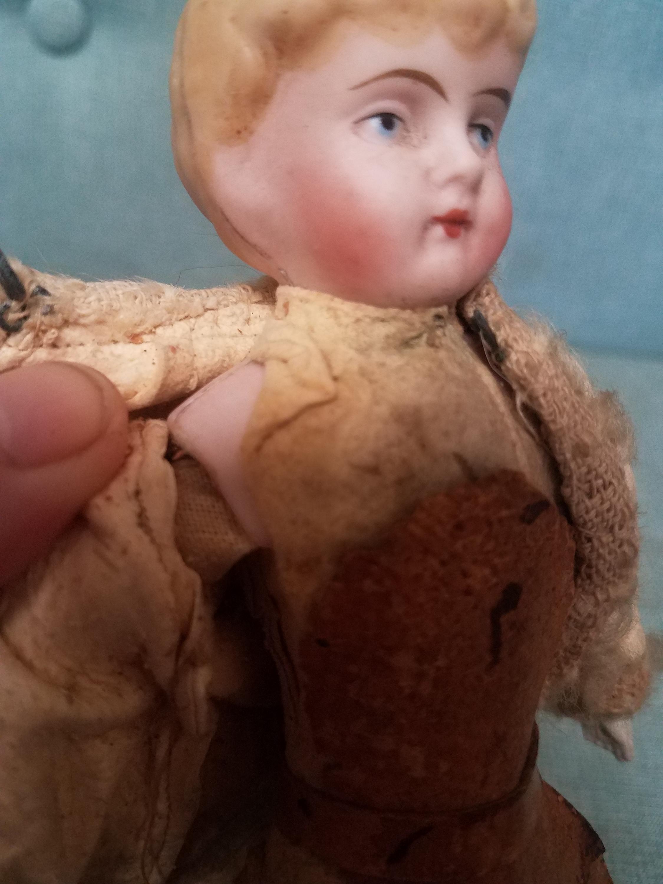 1890s Antique Blonde China Head Doll With Stuffed Body and Leather