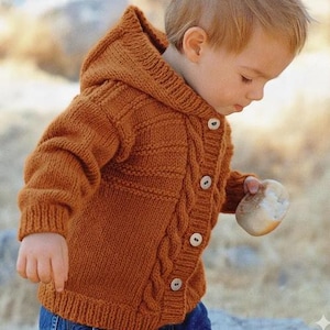 May include: A set of three ceramic mugs with a speckled, matte finish. The mugs are in shades of cream, light gray, and dark gray. Each mug has a simple, minimalist design, perfect for coffee or tea.