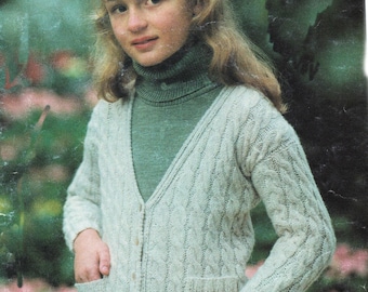 Girl's cable knit cardigan with pockets. knitted in dk/8ply wool- chest 24" up to 33". knitting pattern download pdf