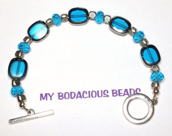 Handmade 7.5" AQUA Blue Silver Rimmed Art Glass Oval BRACELET with Silver and Faceted Crystal Bead Accents and Silver TOGGLE