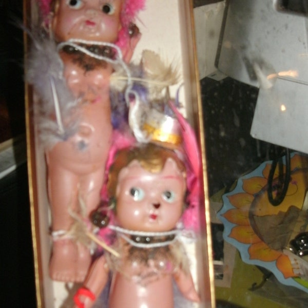 Celluloid  carvinal  Kewpie dolls occupied Japan