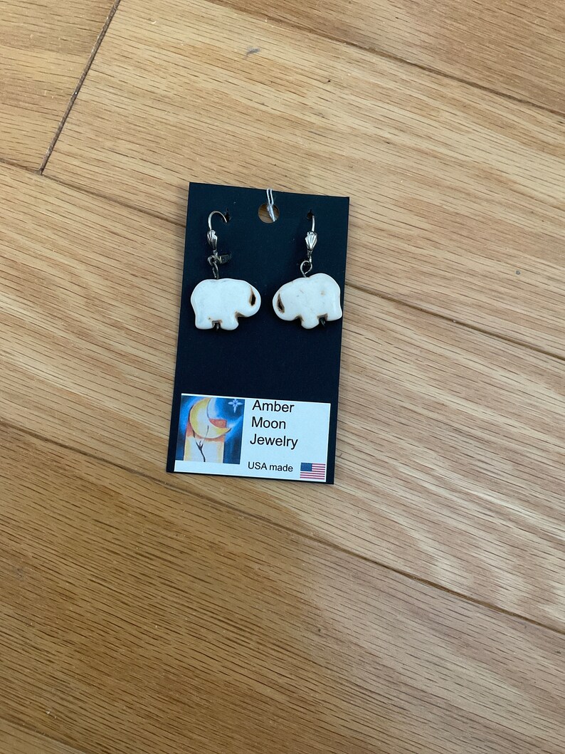 Gemstone Howlite elephant pierced earrings. Perfect gift idea for elephant lovers. Small dangles. Gift box incl. image 1