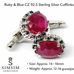 May include: Ruby and blue cubic zirconia 92.5 sterling silver cufflinks. The text reads Ruby & Blue CZ 92.5 Sterling Silver Cufflinks, SIMSIM GEMSTUDIO, Size: Approx. 14-16mm, and Weight: Approx. 12-16 grams(pair). Each features a large red stone.