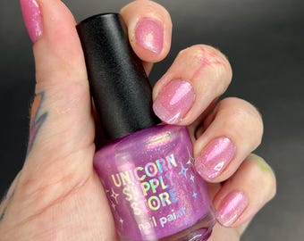 Heartbreak Beat - Skimrande rosa/guldglitter nagellack