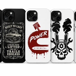 May include: Five smartphone cases featuring automotive-themed graphics. Two are black with white designs including a turbocharger, truck, and text. Three are white with red or black designs featuring a piston, skull, and American flag motif.