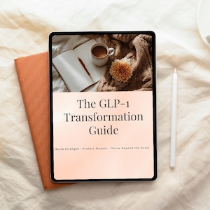May include: A digital tablet displaying "The GLP-1 Transformation Guide" with supporting text. Beside the tablet is a closed orange notebook and a white stylus. The tablet's screen shows a cup of coffee, a notebook, and a flower.