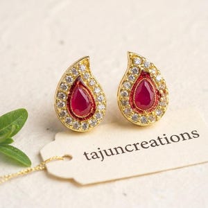 Gold Plated Ruby Red Teardrop Stud Earrings with White Stone Border