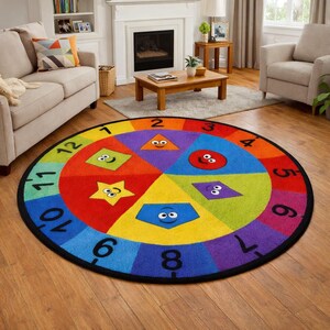 May include: A colorful round rug with a black border. The rug features a clock-like design with numbers and shapes in various colors. Each shape has a smiling face, making it a fun and educational piece for a child's room.
