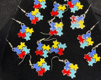 Pendientes rompecabezas del autismo