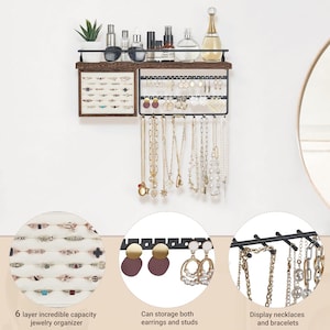 May include: A black metal and wood jewelry organizer with multiple storage options. It features a shelf for bottles and plants, a ring display, earring holders, and necklace and bracelet displays. The text reads: "6 layer incredible capacity jewelry organizer".