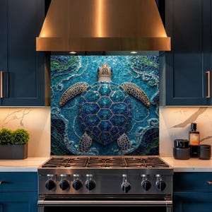 May include: A rectangular kitchen splashback panel featuring a mosaic art design of a sea turtle swimming in deep blue and turquoise waters. The turtle has a detailed shell pattern with gold outlines, set against a textured, swirling aquatic background.