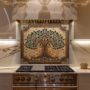 May include: A mosaic backsplash with a tree design, featuring a brown trunk, green leaves, and red accents. The mosaic is framed with a decorative border and set above a stainless steel range.