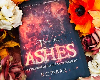 Livro autografado na caixa - Das Cinzas: Um Reino de Feras e Luz das Estrelas (edição brochura).