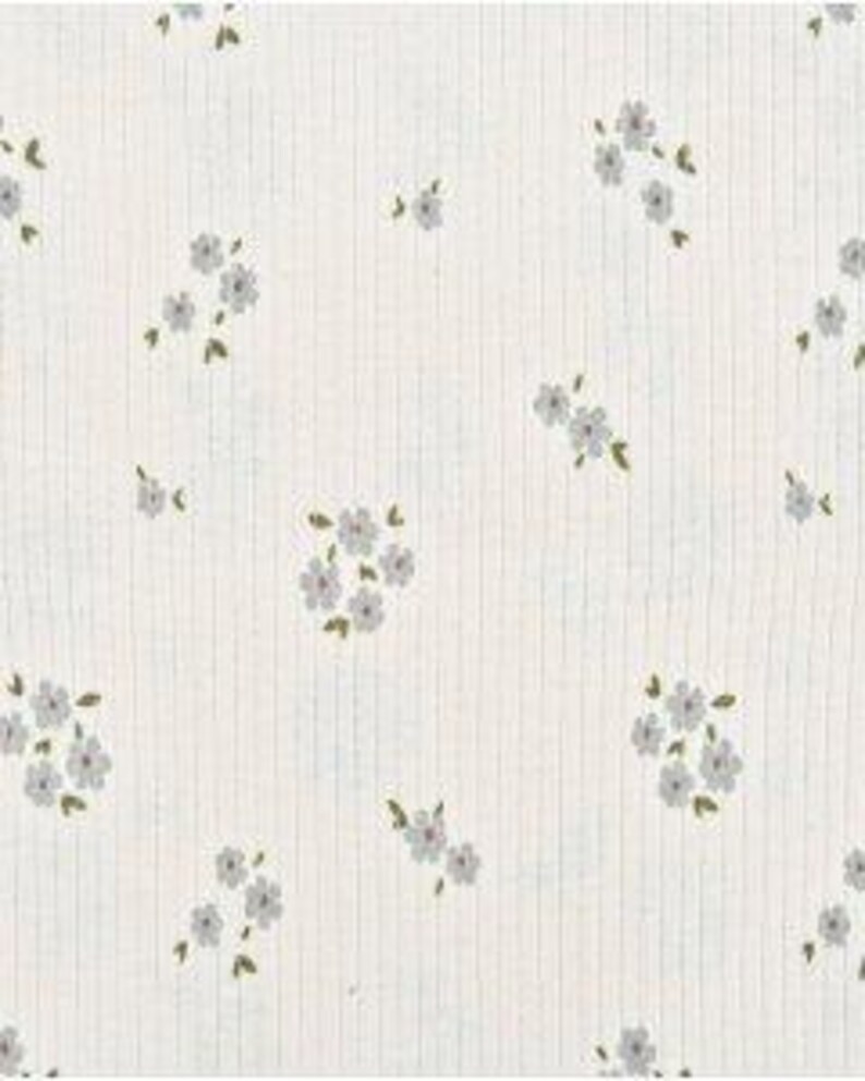 Rib knit fabric close-up of Flowers (Article 6075) Dark Old Green showing textured 2x2 ribs and blooms