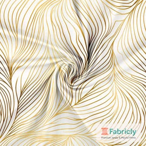 May include: White fabric with a gold, flowing, linear pattern. The design features curved lines that resemble leaves or veins, creating a natural, elegant aesthetic. The fabric has a soft, draped appearance, suggesting a lightweight material.