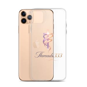 May include: A clear iPhone case with a gold phone inside. The case features a cross design with a swirling ribbon and the text "Threads 333" in gold script. The Apple logo is visible on the phone.