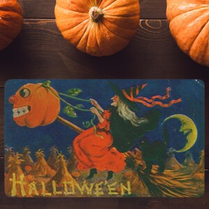 Paillasson vintage sorcière citrouille volante, en polyester | Tapis de porche d'Halloween