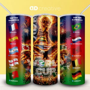 May include: A set of three stainless steel tumblers with straws, featuring a World Cup theme. Each tumbler displays flags and rankings of top teams, with the World Cup trophy and eagle imagery. The text "Top Ten Rankings" is visible.
