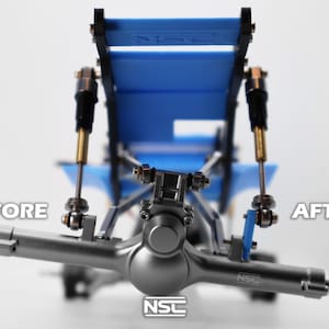 Pu&ograve; includere: Primo piano di un telaio di auto modello, che mostra una modifica con le etichette "PRIMA" e "DOPO". Il telaio &egrave; argentato con dettagli blu. L'immagine si concentra sui dettagli meccanici.
