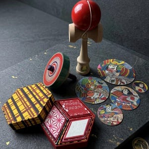 Vintage Japanese Traditional Toy Set Kendama Koma Spinning Top Menko Cards Origami Hexagon Box Authentic Retro Showa Era Collectible Art