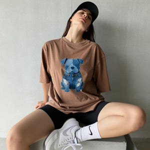 May include: A set of three ceramic mugs with a speckled, matte finish. The mugs are in shades of cream, light gray, and dark gray. Each mug has a simple, minimalist design, perfect for coffee or tea.