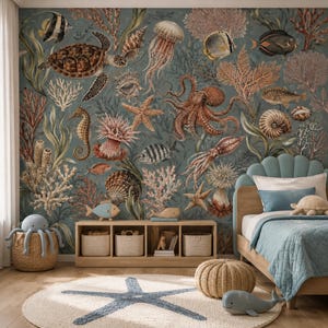 May include: A bedroom featuring a wall mural with a detailed underwater scene of sea turtles, octopuses, jellyfish, seahorses, and coral reefs in muted tones. The room includes a light blue bed, a wooden storage unit, and a round starfish rug.