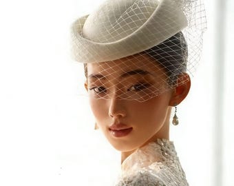 Elegant White Bridal Fascinator With Netting and Floral  display picture 3