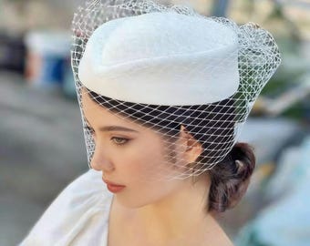 Elegant White Bridal Pillbox Hat with Birdcage Veil