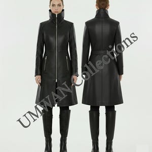 May include: A black leather coat with a high collar and a full-length zipper. The coat has a fitted silhouette and reaches to the mid-calf. The image shows the front and back of the coat. The text "UMWAN collections" is visible.