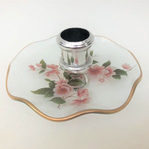 Glazen kaarsenhouder met golvend ontwerp en bloemen