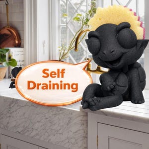 May include: A set of three ceramic mugs with a speckled, matte finish. The mugs are in shades of cream, light gray, and dark gray. Each mug has a simple, minimalist design, perfect for coffee or tea.