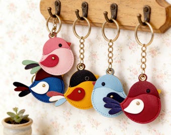 Handgemaakte suèdeleren vogelsleutelhangers | Kleurrijke tashangers met dierenprint, tasaccessoire