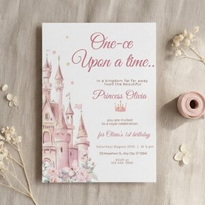 May include: A princess-themed invitation with a pink castle illustration and the text "One-ce Upon a time..." The invitation is for Olivia's 1st birthday, with date, time, and RSVP information. The design includes floral accents.