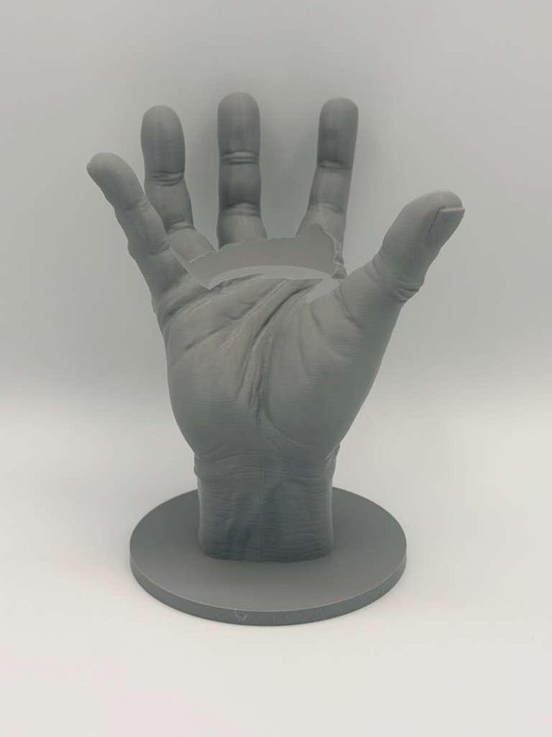 May include: A handmade wooden sign with the text "Welcome to our home" in a handwritten style. The sign is painted white with black lettering and a distressed finish, perfect for home decor.