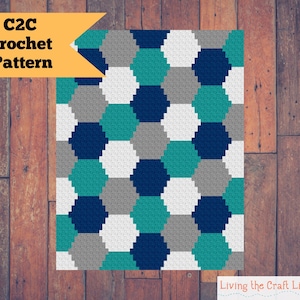 May include: C2C Crochet Pattern featuring a geometric design with teal, navy blue, white, and gray hexagons.