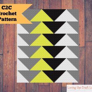 Può includere: Modello di uncinetto C2C con un design geometrico con triangoli gialli, neri, bianchi e grigi.