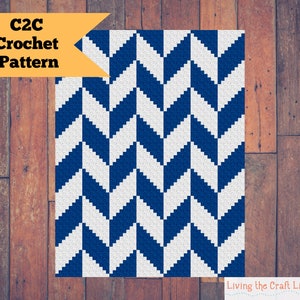 May include: C2C Crochet Pattern: A digital pattern for a chevron design in white and blue.