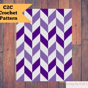 Puede incluir: Patrón de crochet C2C con un diseño de chevron en tonos de morado y blanco.