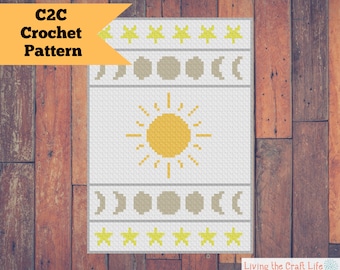 May include: C2C Crochet Pattern for a sun and moon design with yellow stars. The pattern is on a white background with a yellow sun, gray moons, and yellow stars.