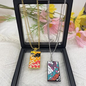 Collana ispirata a Demon Slayer di Anime / Ciondolo in metallo con personaggio anime, regalo per fan