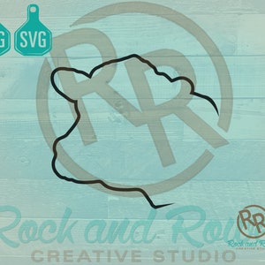 May include: A black outline of a cow's head is centered on a light blue wooden background. Two teal tags with the text "PNG" and "SVG" are in the upper left. The words "Rock and Rowel Creative Studio" are at the bottom.