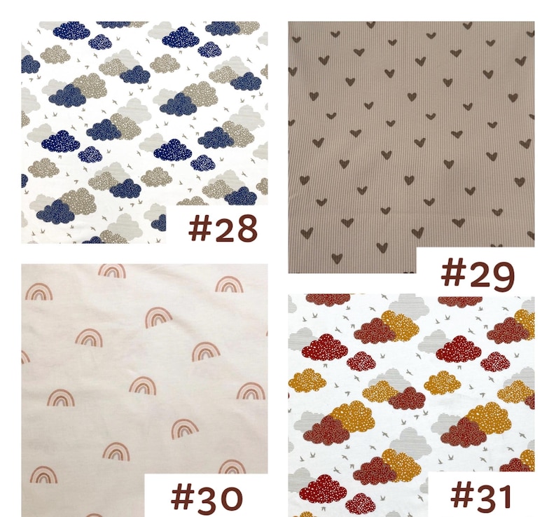 May include: Four fabric swatches labeled #28 through #31. #28 features navy and beige clouds on white. #29 shows brown hearts on a ribbed beige background. #30 displays small pink rainbows on a light background. #31 shows red and gold clouds on white.