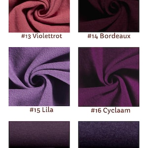 May include: A grid of six fabric swatches in various shades of purple and red. The swatches are labeled #13 Violettrot, #14 Bordeaux, #15 Lila, #16 Cyclaam, #17 Mauve, and #18 Lila meliert, each showing a textured, folded fleece-like material.