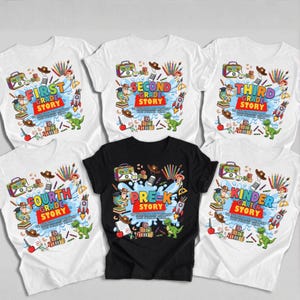 May include: Five t-shirts featuring colourful cartoon graphics with school-themed text including First Grade Story, Second Grade Story, Third Grade Story, Fourth Grade Story, Pre-K Story, and Kindergarten Story, along with illustrations of toys and school supplies.