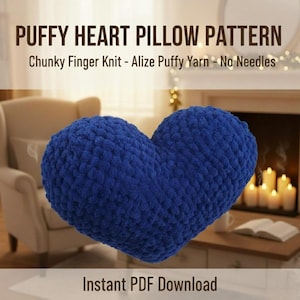 May include: A large, heart-shaped pillow in a vibrant blue hue. The pillow has a textured, chunky knit appearance, suggesting a soft and cozy feel. Text at the top reads "PUFFY HEART PILLOW PATTERN". The bottom text says "Instant PDF Download".