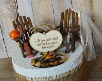 shot gun-riffle-hunting-wedding-cake topper-gun-deer country weddinghunting groom-grooms cake-Mossy oak-themed-camouflage bride groom hunter